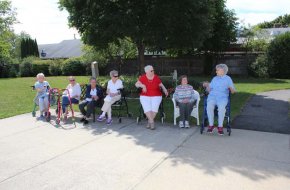 Residents enjoy sitting on outside bench